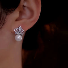 Close-up detail of the sparkling zircons and plating on the Crown Pearl Earrings