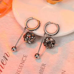 Close-up detail of the sparkling zircons and plating on the Crystal Ball Earrings