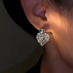 Close-up detail of the sparkling zircons and plating on the Gray Pearl Earrings