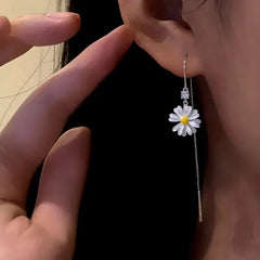 Close-up detail of the sparkling zircons and plating on the Daisy Threader Earrings