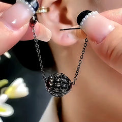 Angled view of the 14K Gold-Plated Zircon Diamond Ball Earrings