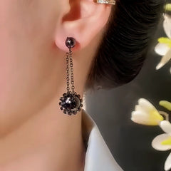 Close-up detail of the sparkling zircons and plating on the Gold Ball Earrings