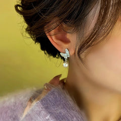 Close-up detail of the sparkling zircons and plating on the Butterfly Bead Earrings