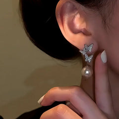 Close-up detail of the sparkling zircons and plating on the Butterfly Tassel Earrings
