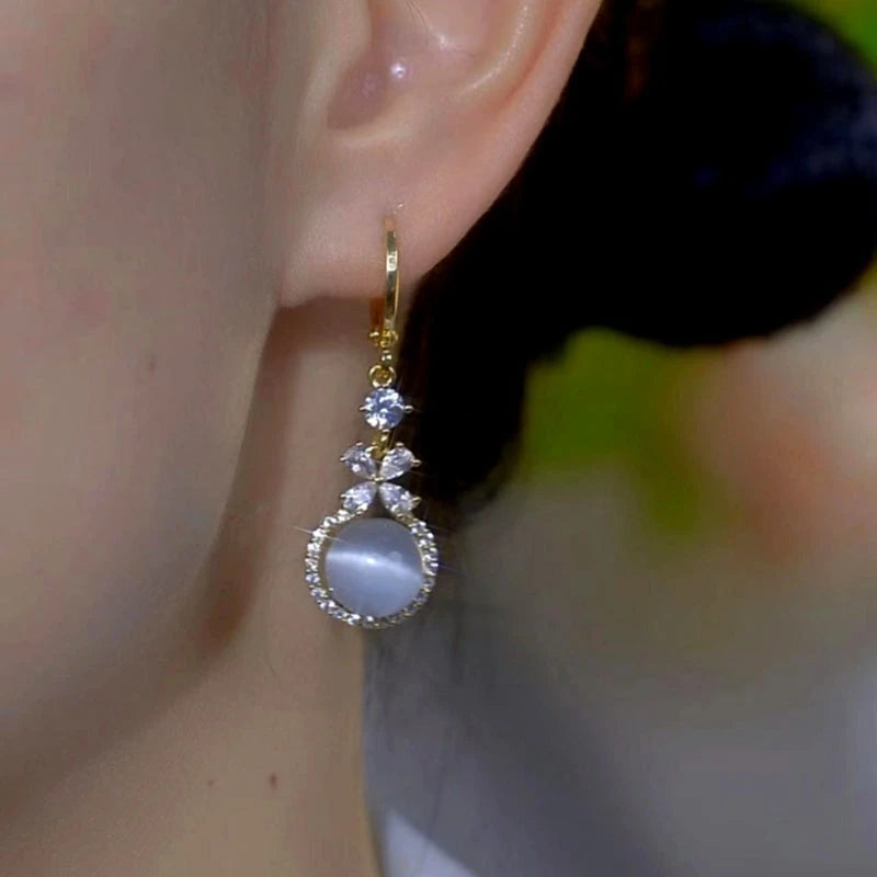 Close-up detail of the sparkling zircons and plating on the Cat's Eye Bead Earrings