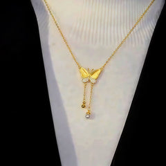 Close-up of the pendant and clasp on the Butterfly Tassel Necklace