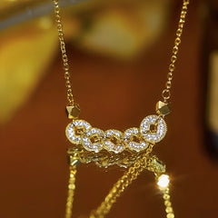 14K Gold-Plated Zircon Diamond Coin Tassel Necklace worn to showcase its length and pendant detail