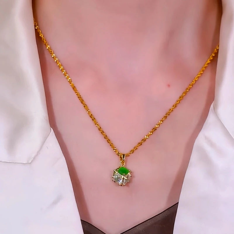 Close-up of the pendant and clasp on the Green Cat's Eye Necklace