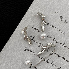 Close-up detail of the sparkling zircons and plating on the Leaf Ear Cuff