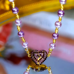 Styling the 14K Gold-Plated Zircon Diamond Magnetic Heart Pearl Necklace with a beautiful outfit