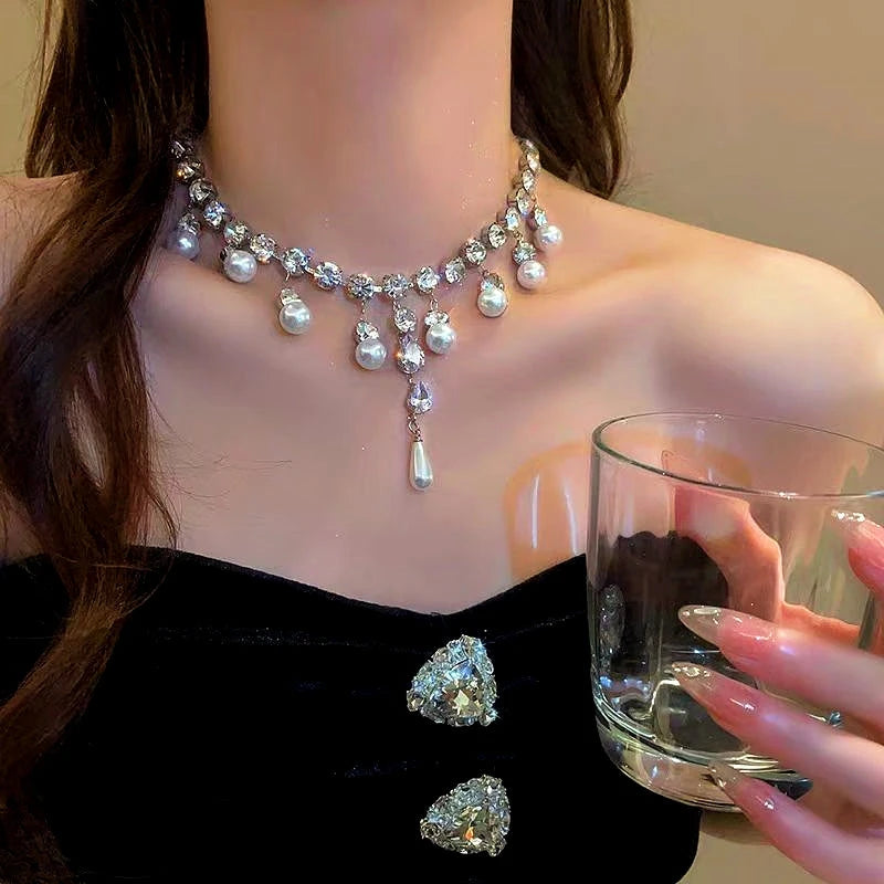 Detailed view of the 14K Gold-Plated Zircon Diamond Pearl Drop Necklace chain and pendant