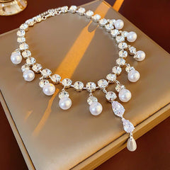 The perfect Pearl Drop Necklace for layering or wearing as a statement piece