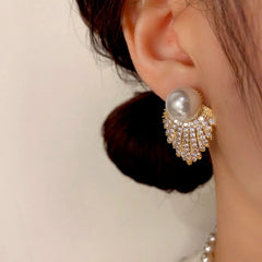 Close-up detail of the sparkling zircons and plating on the Pearl Tassel Earrings