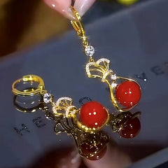 Close-up detail of the sparkling zircons and plating on the Lucky Bag Earrings