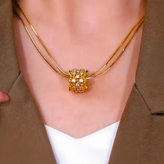 Close-up of the pendant and clasp on the Ring Pendant Necklace