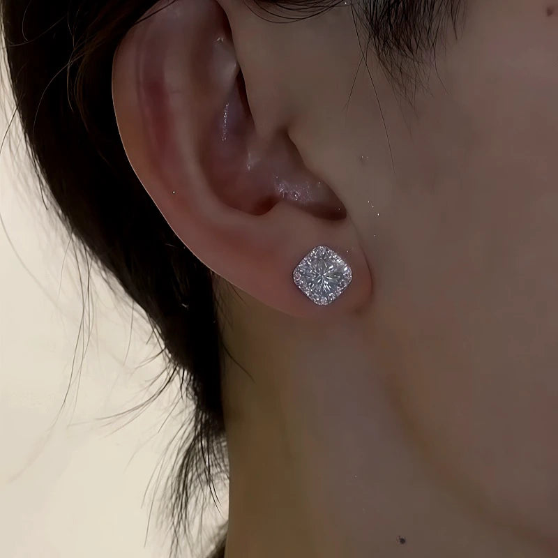 Model showcasing the dangle and style of the 14K Gold-Plated Zircon Diamond Stud Earrings