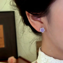 Close-up detail of the sparkling zircons and plating on the Floral Stud Earrings