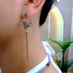 Close-up detail of the sparkling zircons and plating on the Celestial Tassel Earrings