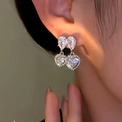 Close-up detail of the sparkling zircons and plating on the Sweet Double Heart