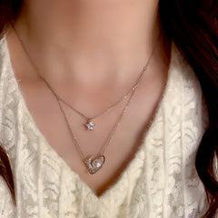 14K Gold-Plated Zircon Double-Layer Star And Moon Necklace worn to showcase its length and pendant detail