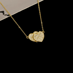 Close-up of the pendant and clasp on the Convertible Heart Necklace