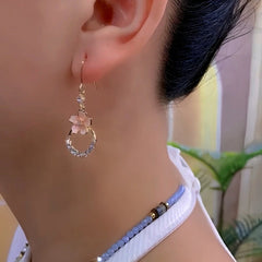 Close-up detail of the sparkling zircons and plating on the Cascading Flower Ear Hooks
