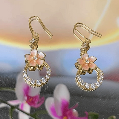 Angled view of the 14K Gold-Plated Zircon Flower Ear Hooks
