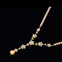 14K Gold-Plated Zircon Flower Pearl Necklace worn to showcase its length and pendant detail
