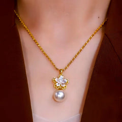 14K Gold-Plated Zircon Flower Pearl Pendant Necklace worn to showcase its length and pendant detail