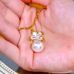 Close-up of the pendant and clasp on the Floral Pearl Pendant