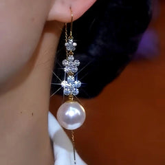 Close-up detail of the sparkling zircons and plating on the Floral Pearl Threaders
