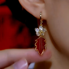 Close-up detail of the sparkling zircons and plating on the Red Leaf Flower