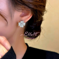 Close-up detail of the sparkling zircons and plating on the Classic Flower Studs