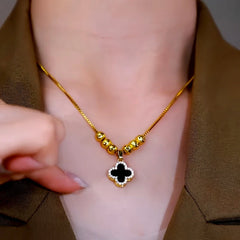 Close-up of the pendant and clasp on the Classic Clover Pendant