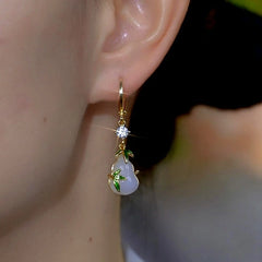 Close-up detail of the sparkling zircons and plating on the Bamboo Gourd Drops