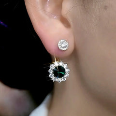 Model showcasing the dangle and style of the 14K Gold-Plated Zircon Green Diamond Jacket Earrings