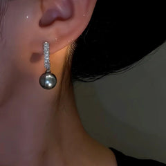 Close-up detail of the sparkling zircons and plating on the Gray Pearl Drops