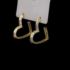 Angled view of the 14K Gold-Plated Zircon Heart-Design Earrings