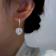 Close-up detail of the sparkling zircons and plating on the Golden Heart Drops