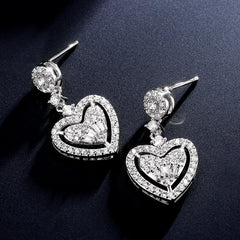 Angled view of the 14K Gold-Plated Zircon Heart Earrings