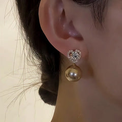 Close-up detail of the sparkling zircons and plating on the Tortoiseshell Heart Pearl