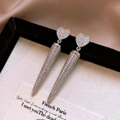 Close-up detail of the sparkling zircons and plating on the Silver Heart Tassel