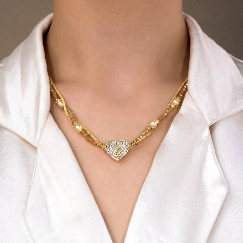 Close-up of the pendant and clasp on the Convertible Heart Lariat