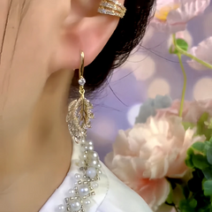 Close-up detail of the sparkling zircons and plating on the Hollow Leaf Ear Hooks