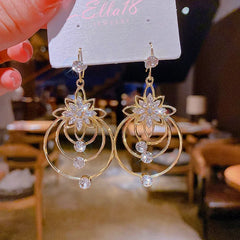 Close-up detail of the sparkling zircons and plating on the Ice Flower Ear Hooks