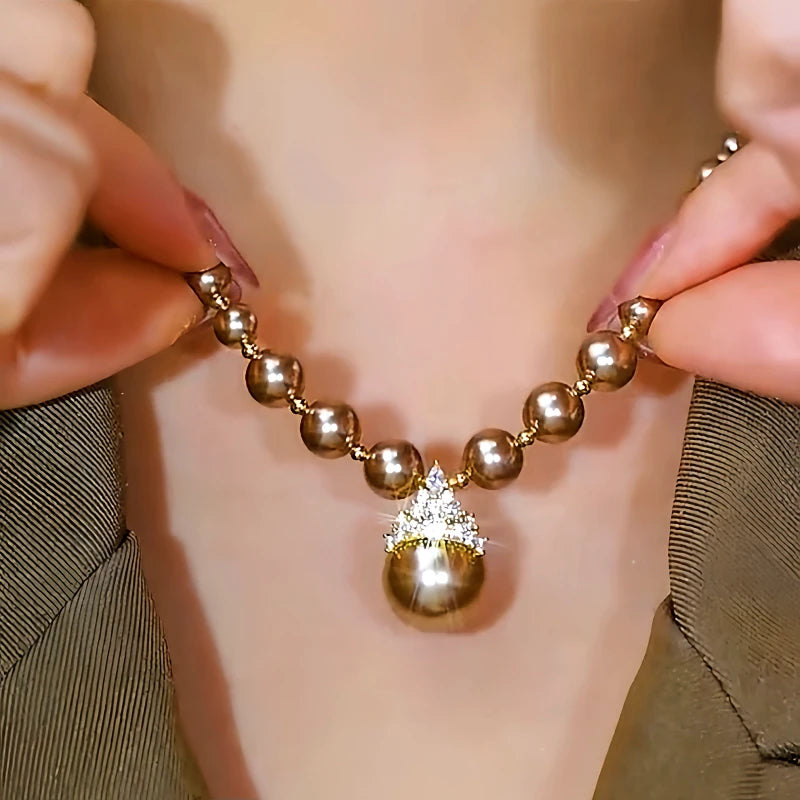 Close-up of the pendant and clasp on the Champagne Pearl Halo