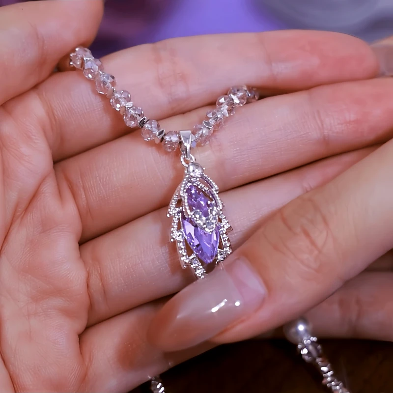 Close-up of the pendant and clasp on the Purple Jade Leaf