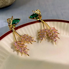 Angled view of the 14K Gold-Plated Zircon Leaf Earrings