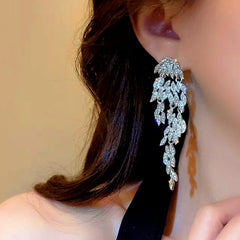 Close-up detail of the sparkling zircons and plating on the Silver Leaf Tassel