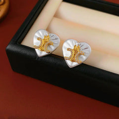 Angled view of the 14K Gold-Plated Zircon Letter Heart Stud Earrings